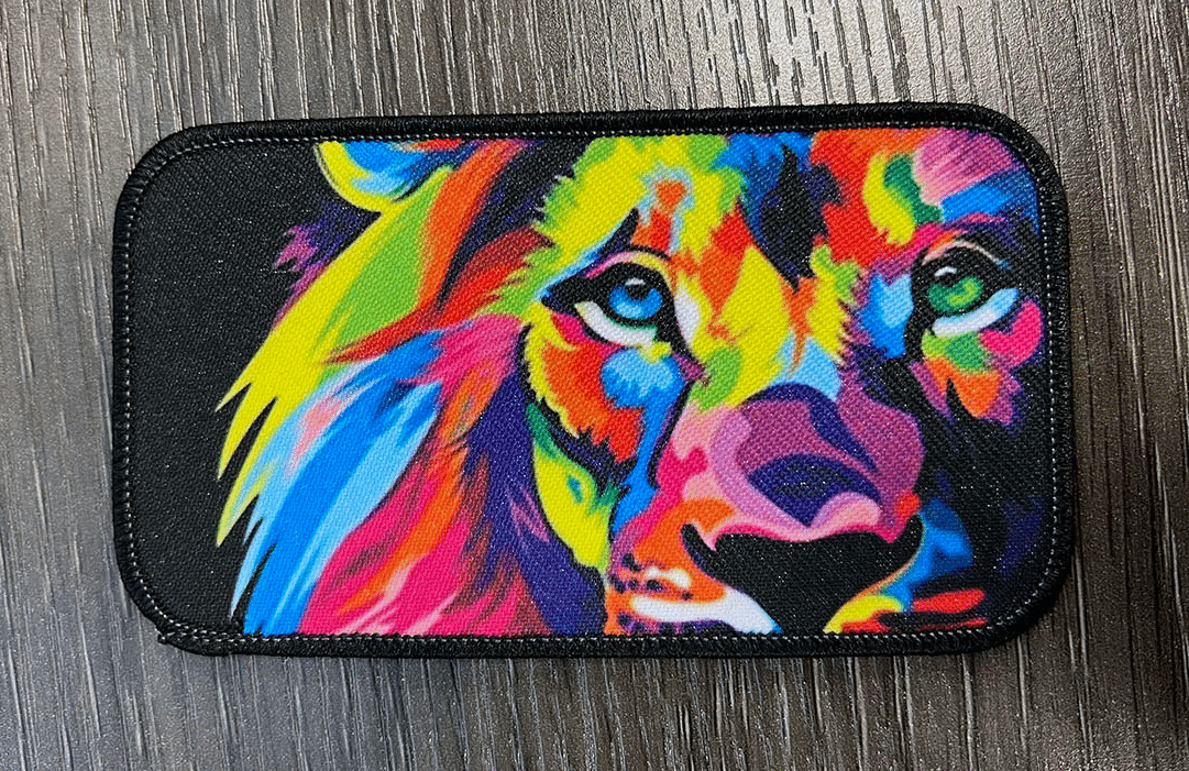 multi color lion logo on black pouch